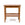Florian side table finished in a walnut stain with burnished-gold rosettes by Bunny Williams Home