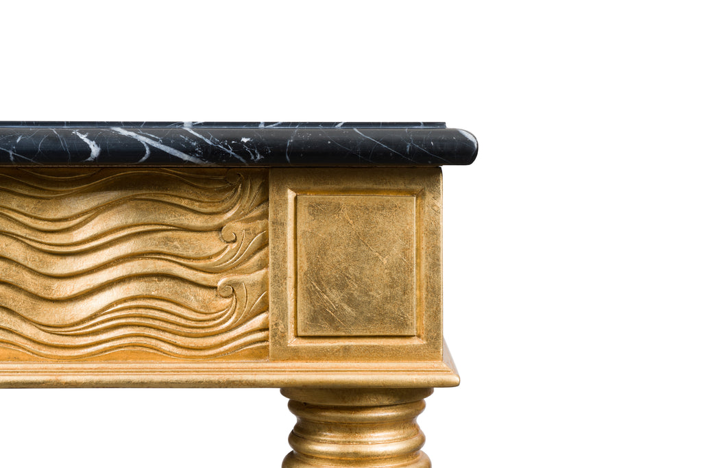 dark stone top with a and carved gold gilded base giselle console table by bunny williams home