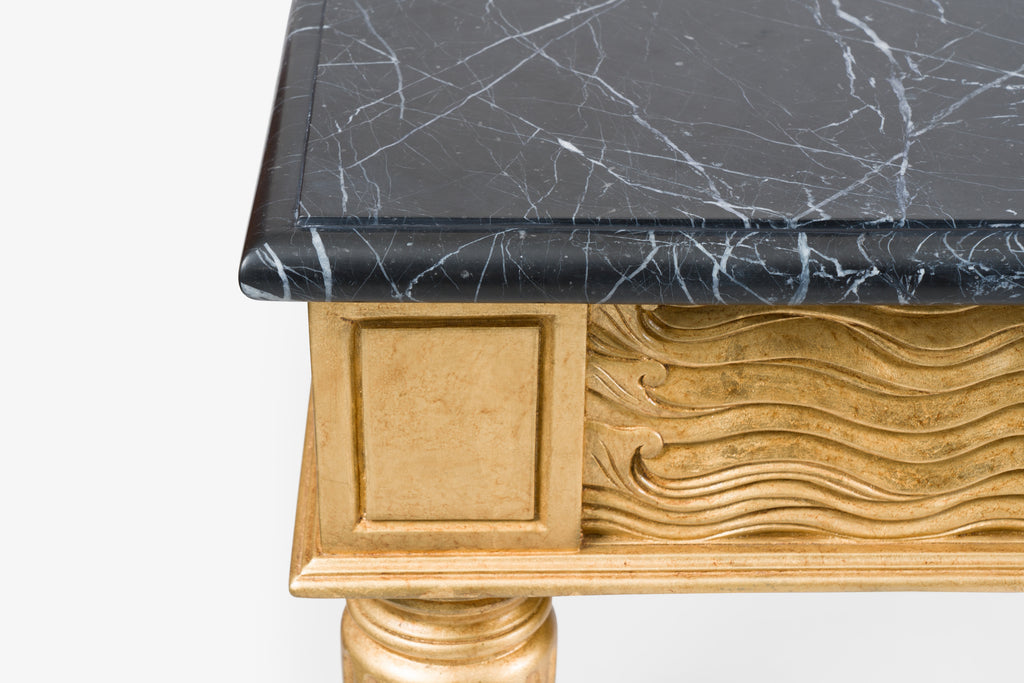 dark stone top with a and carved gold gilded base giselle console table by bunny williams home