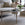 Living room with a coffee table, sofa, and decorative elements.