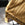 Close-up of a wicker bench with blurred background