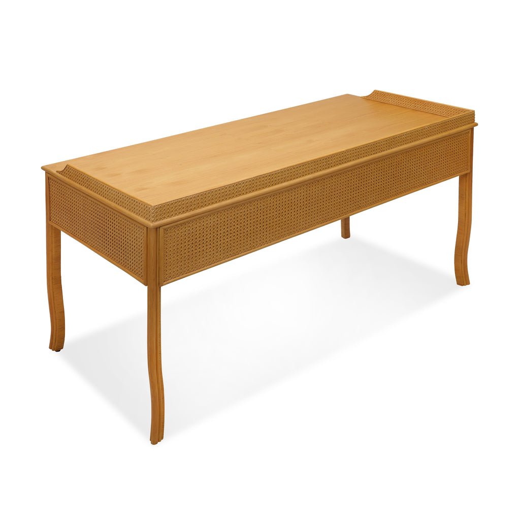 heron paneled cane desk with three drawers