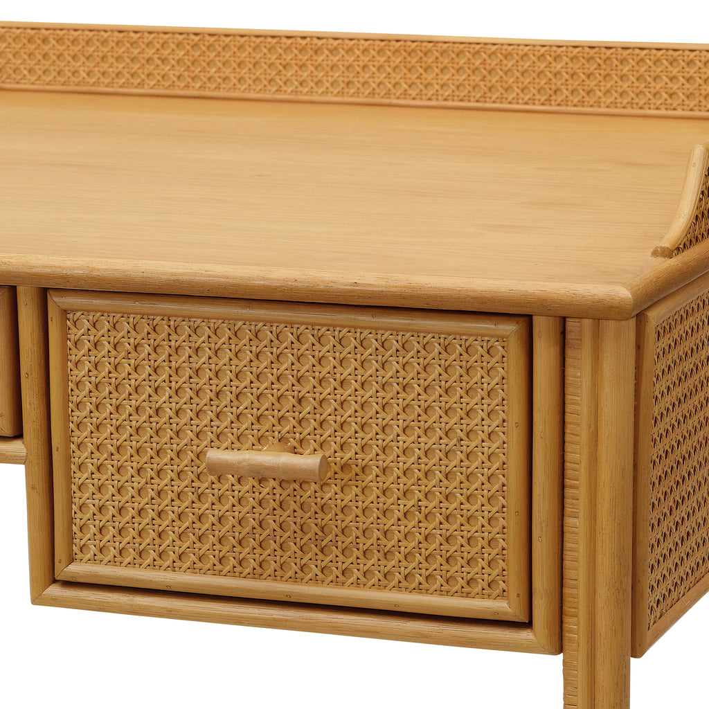 heron paneled cane desk with three drawers
