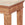 Wooden table with intricate carvings and a marble top on a white background