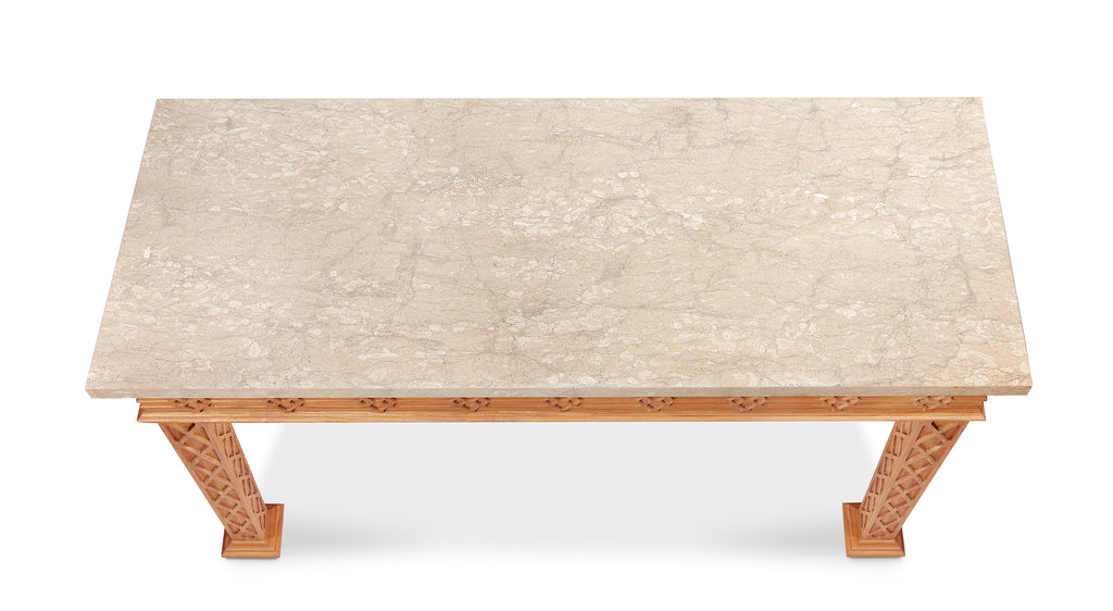 howard outdoor console table with a light-marble top with carved legs by bunny williams home