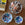 three ceramic dishes on top of a Tambour Coffee Table by Bunny Williams Home