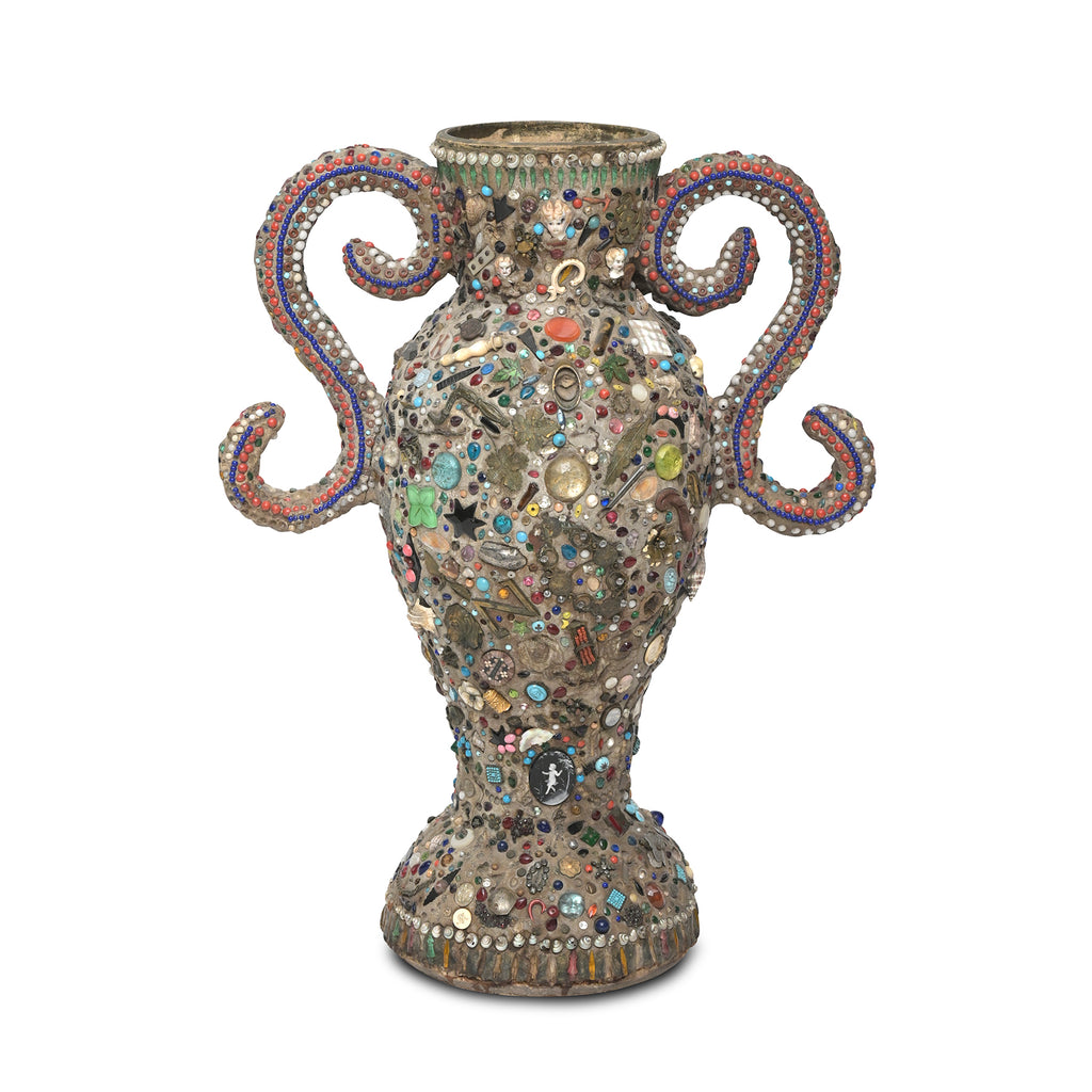 a front view of a folk art memory vase with two handles